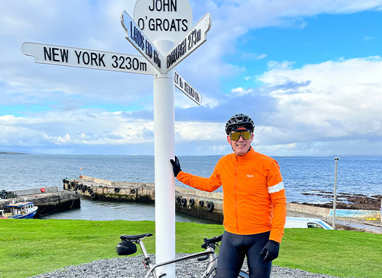 Tom Webb on bike for Tour de Manc