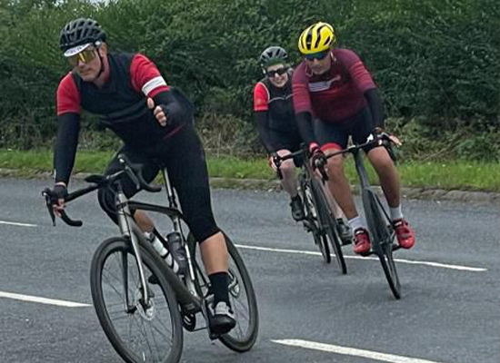 Tom Webb on bike for Tour de Manc